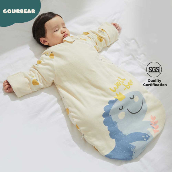 A newborn anti-kick cotton sleep bag designed for comfortable sleep, featuring Little Dinosaur pattern. 220g thick cotton for 0-10℃ and 160g thick cotton for 10-15℃ available in Gourbear brand