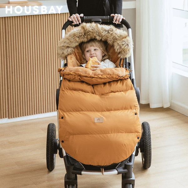Stay warm and dry with the Winter Windproof and Waterproof Stroller Footmuff for babies 0-3 years old. Cozy padding, adjustable hood, and waterproof material keep your baby comfortable during outdoor walks brown color 
