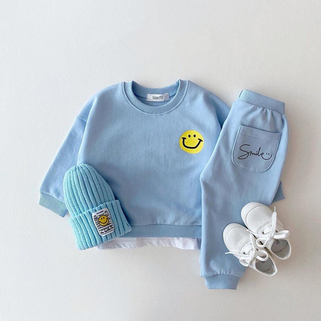 Smiley-sweatshirt + joggingbroek-outfit