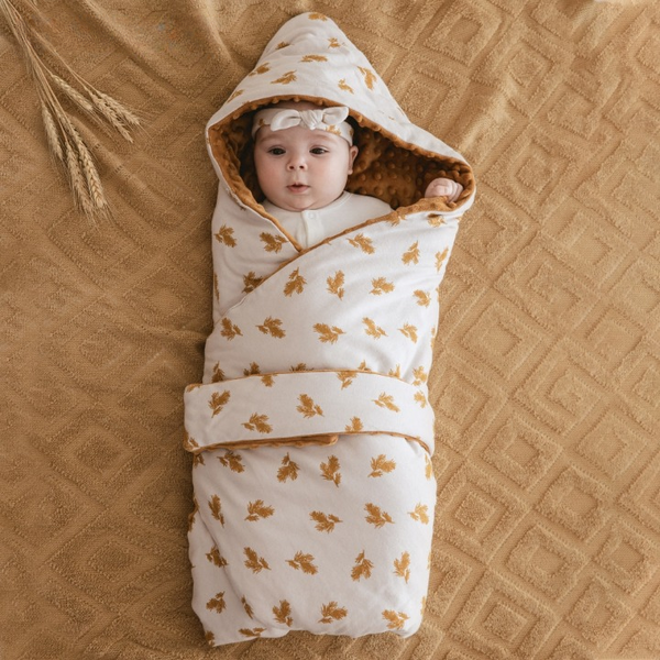 Vintage pattern Image of a cozy and secure newborn baby swaddle sack designed for infant sleep, suitable for 0-3 months with TOG 0.5 rating