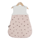 baby wearing a sleeveless sleep bag, suitable for ages 0-2 years with a 0.5 TOG rating for warmth product pattern Dandelion 